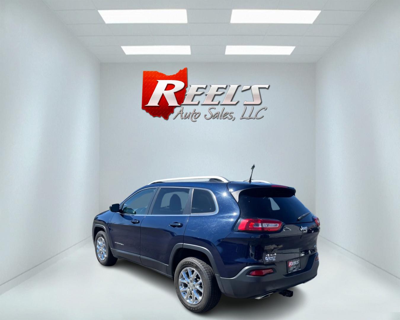 2016 Blue /Black Jeep Cherokee Latitude 4WD (1C4PJMCS1GW) with an 3.2L V6 DOHC 24V engine, 9-Speed Automatic transmission, located at 11115 Chardon Rd. , Chardon, OH, 44024, (440) 214-9705, 41.580246, -81.241943 - Photo#22